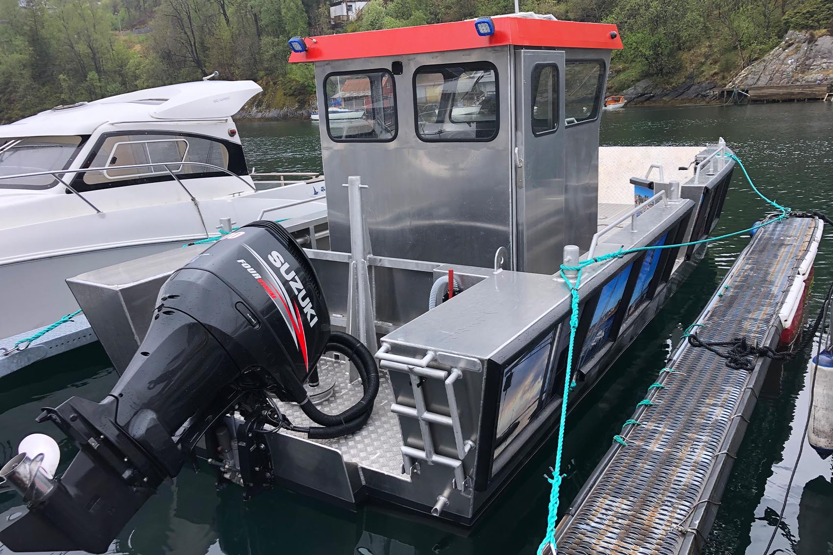 tch marine | landing craft TB700 by the seashore